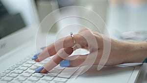 Business woman, student using laptop computer at desk, female hands typing on notebook keyboard studying working with pc