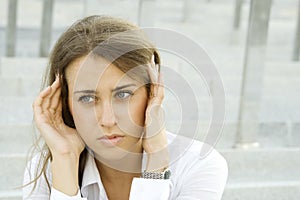 Business woman suffering from headache