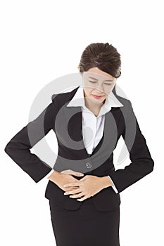 Business woman suffers from stomach ache