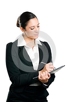 Business woman taking notes on clipboard