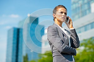 Business woman talking cell phone