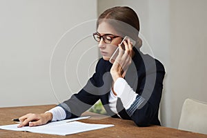 Business woman talking on phone