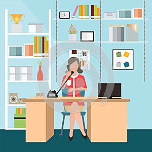 Business woman talking on the phone in office.