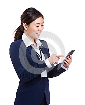 Business woman text from her cellphone