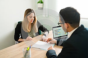 Business woman about to sign a contract for a new job