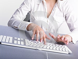 Business Woman Typing on Computer Keyboard