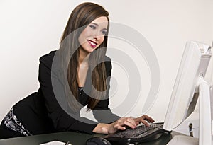 Business Woman typing on computer keyboard