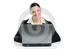 Business woman typing on laptop