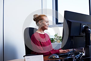 Business woman, typing and planning on computer at office desk for email management and task update. Secretary, worker