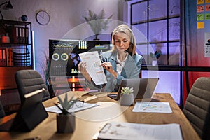 Business woman using headset and laptop for video call