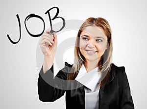 Business woman using her marker for writing