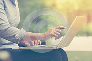 Business woman using laptop computer.