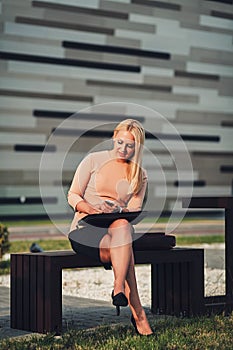 Business woman using mobile application on cell phone