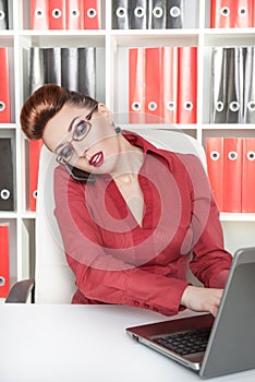 Business woman using mobile phone and working