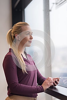 Business woman using smart phone at office