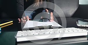 Business woman using stamp on document