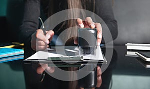 Business woman using stamp on document