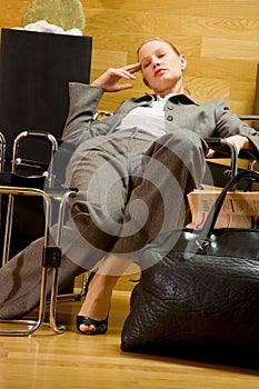 Business woman waiting in office lobby