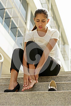 Business Woman Walking On High Heels Feeling Pain At Feet