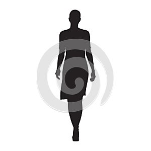 Business woman walking, isolated vector silhouette, front view