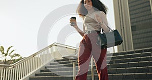 Business, woman and walking on stairs with coffee in city outdoor for morning travel to work or commute. Person, fashion