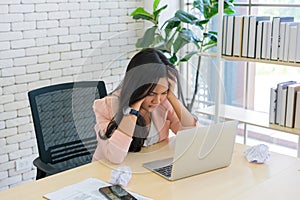 Business woman work from home suffering stress and feel tired after working on tablet computer, Lifestyle woman relax after