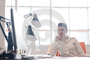 Business woman working on computer at office