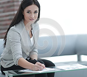 Business woman working with documents in the office