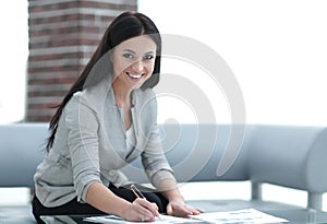 Business woman working with documents in the office