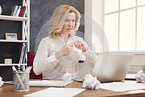 Business woman working with documents at office desktop