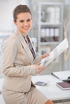 Business woman working with documents in office