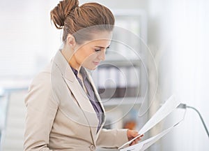 Business woman working with documents in office