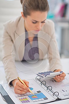 Business woman working with documents in office