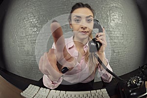 Business woman working in her office on the computer