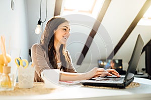 Business woman working from home on laptop computer.Checking email.Working from distance.Online business career.Writer editor.