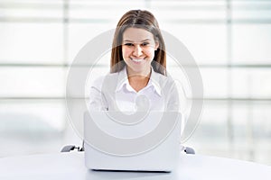 Business woman working on laptop