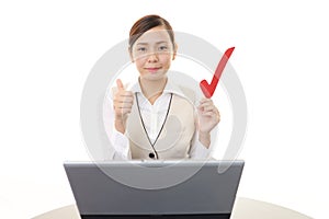 Business woman working on a laptop