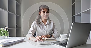 Business woman working with laptop computer and calculator she analyst financial advisor preparing statistic report