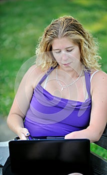 Business woman working on laptop - disability