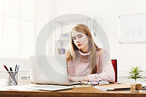 Business woman working on laptop at office