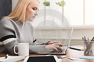 Business woman working on laptop at office