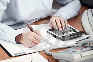 Business woman working at office.