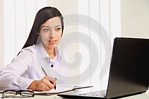 Business Woman works with a laptop (business, money, production, reporting, perspective, success)