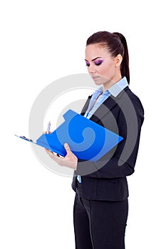 Business woman writing on a clipboard