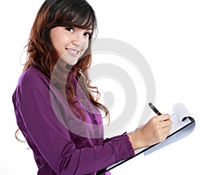 Business woman writing on document