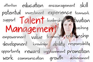 Business woman writing talent management concept. photo