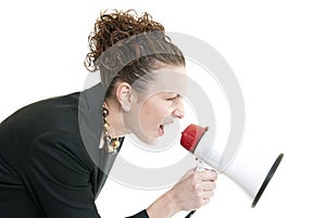 Business woman yelling into a bullhorn