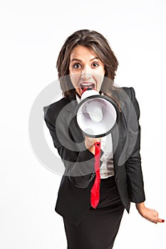 Business woman yelling in megaphone