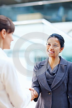 Business women, handshake and introduction to job interview, Human Resources meeting or welcome for hiring. Professional