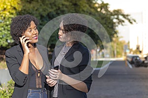 Business women talking on the phone